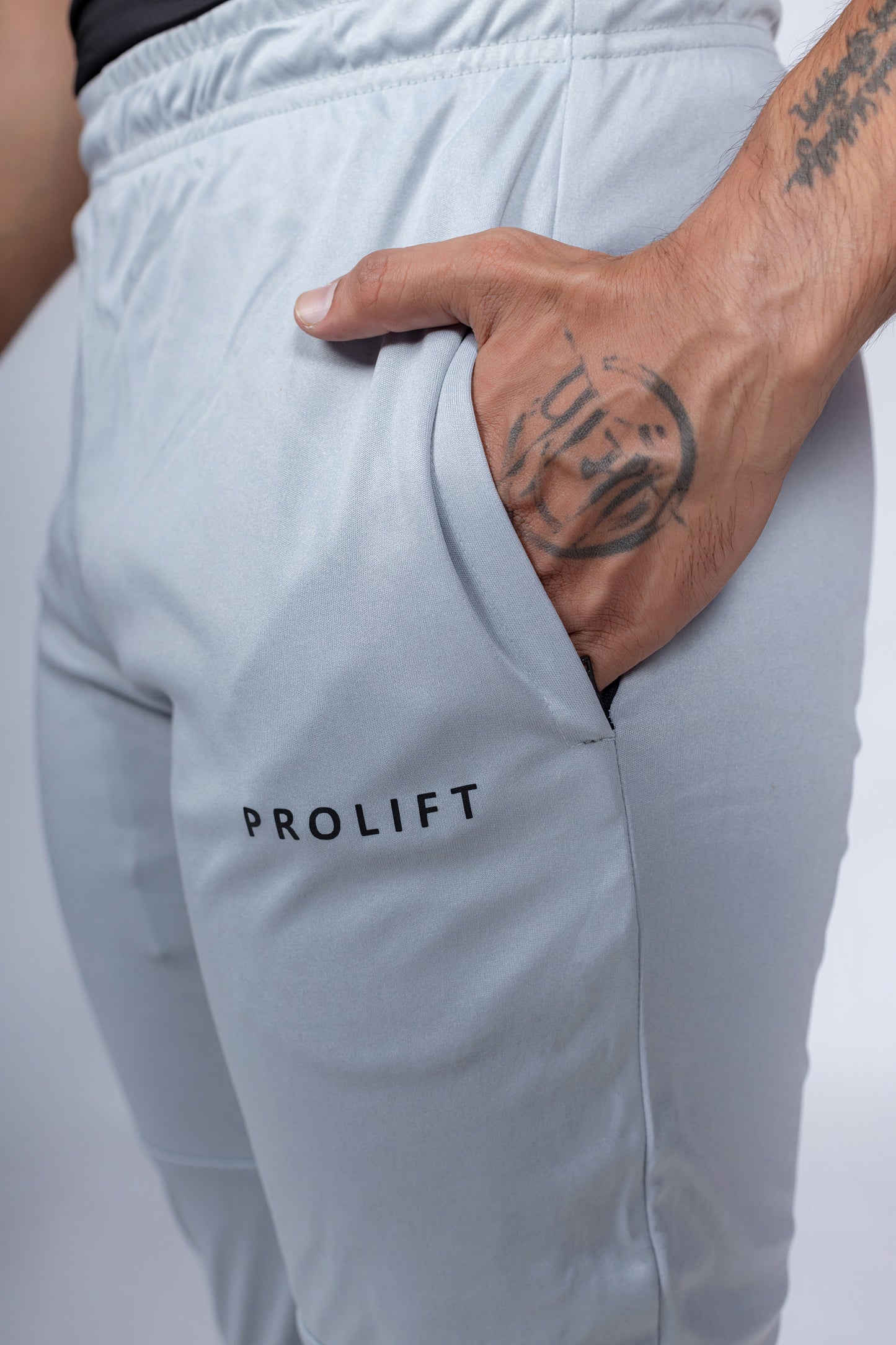 REGULAR TRACK PANTS-LIGHT GREY