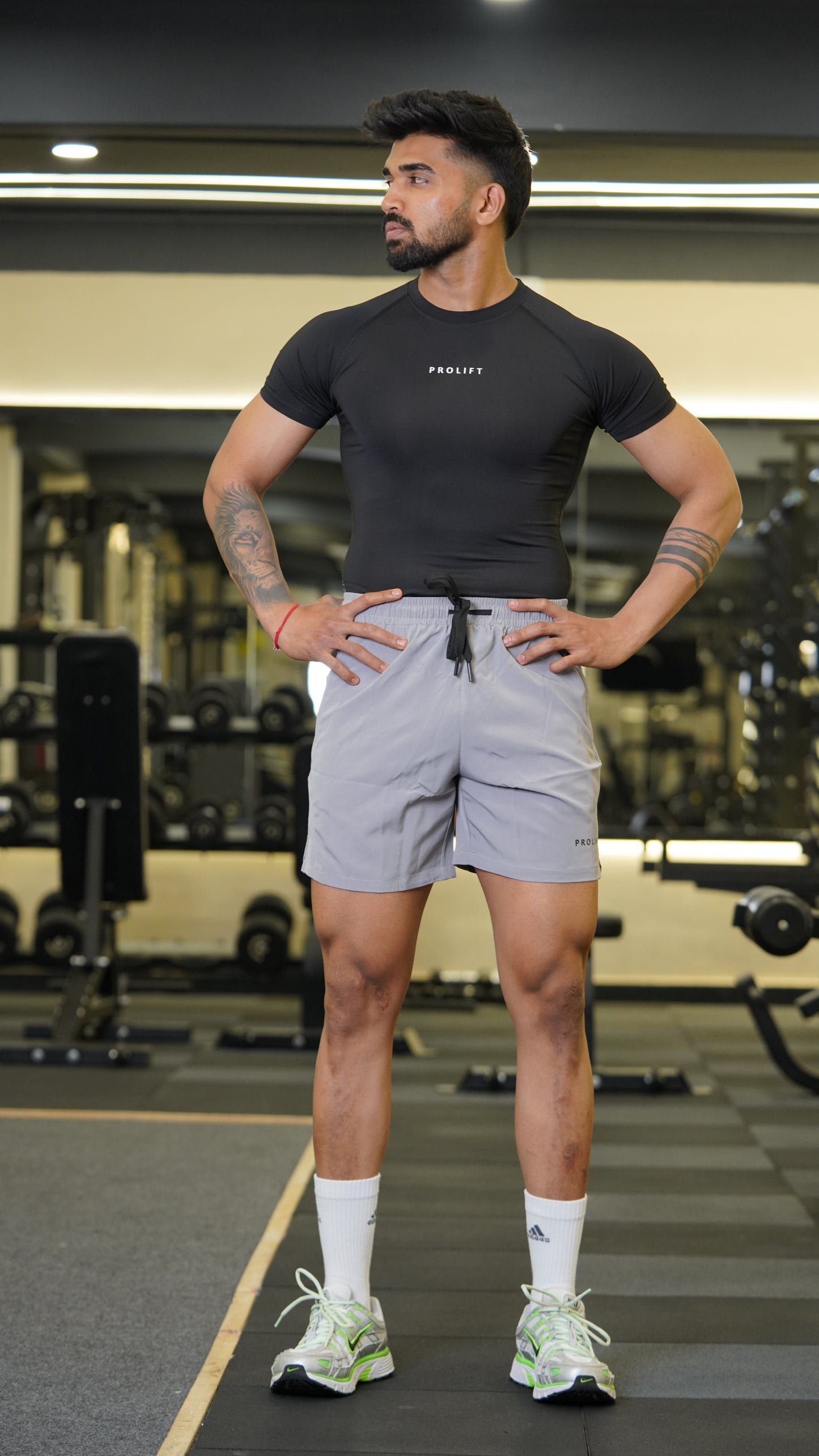 GREY SHORTS AND BLACK COMPRESSION
