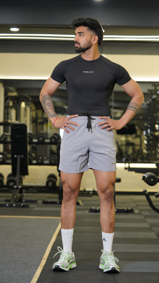 GREY SHORTS AND BLACK COMPRESSION
